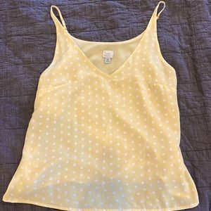 Yellow and white polka dot tank top